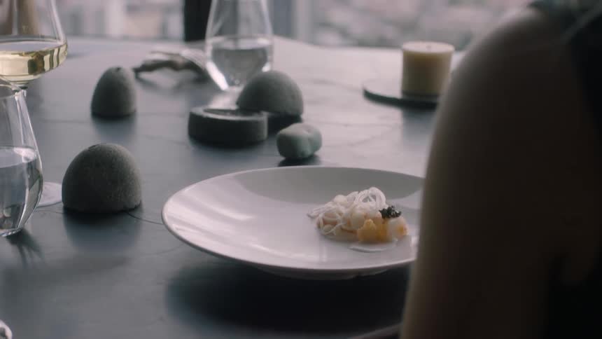 Dishes are served at a table