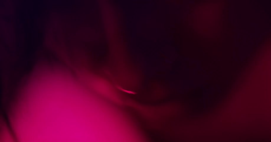 Woman concentrates as she moves rhythmically