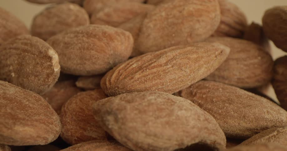 Close up of a small pile of roasted almonds