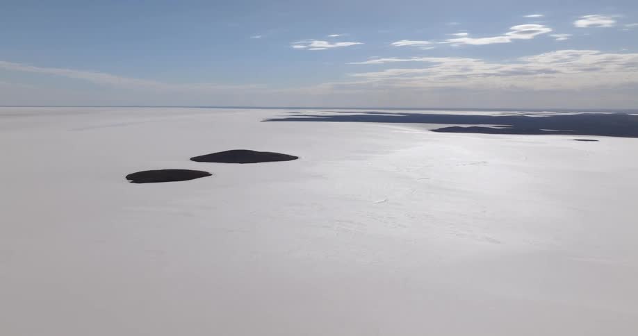 Panoramic aerial view of the flat white plains on a desert at daytime
