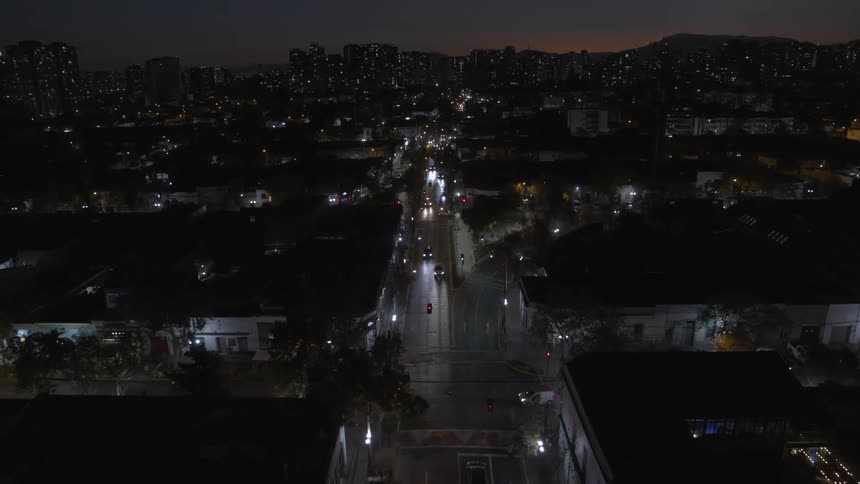 Traffic flows at night in Santiago