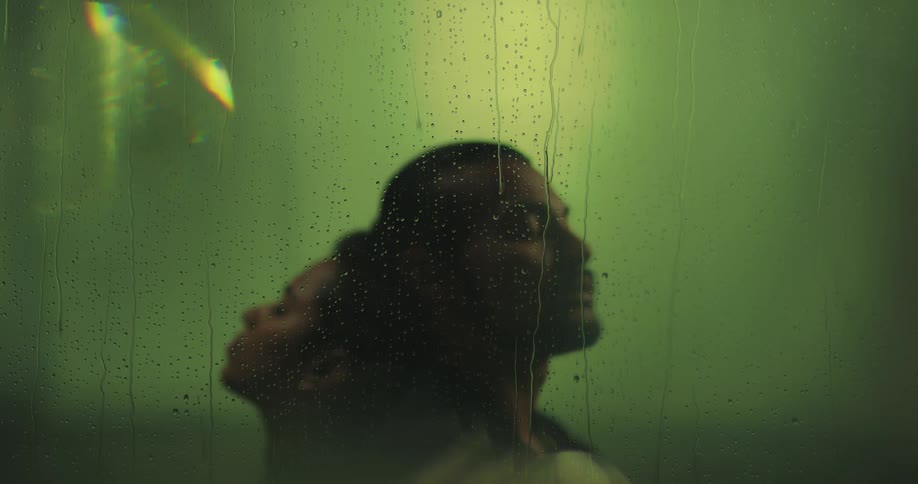 A man and woman are bathing together