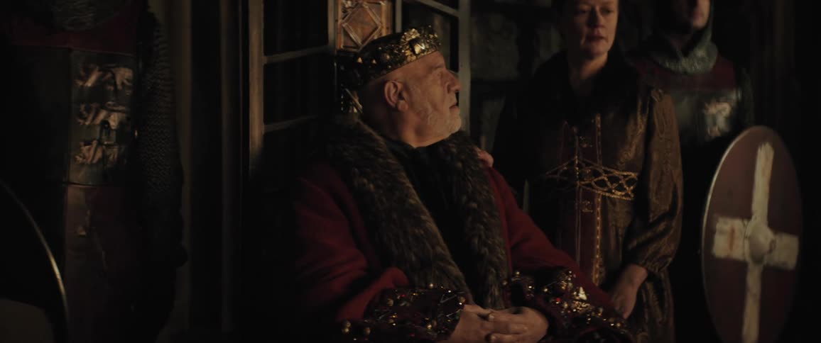 A king is sitting on his throne
