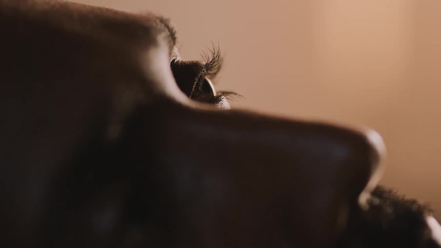 Close up view of a mans face is displayed at midday