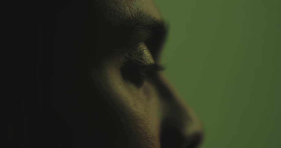 Close up view of a mans face is displayed