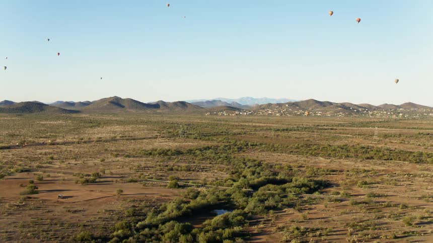 Hot air balloons fill the Arizona sky