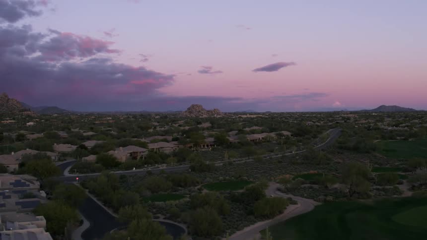 Golf Course and Development under pink Arizona sky