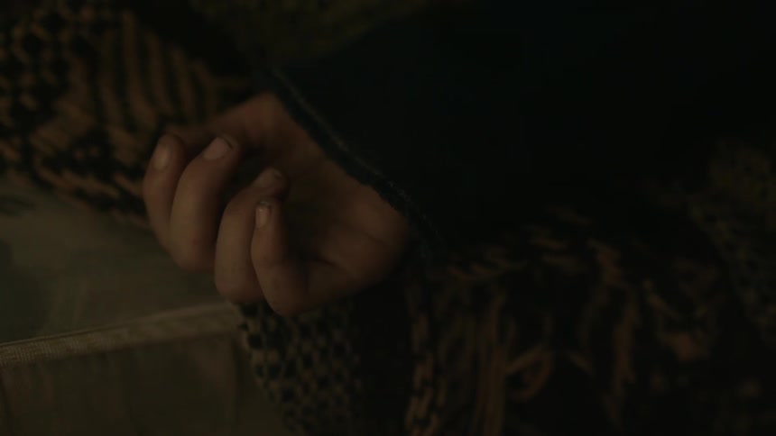 A person is resting with their hand laying down