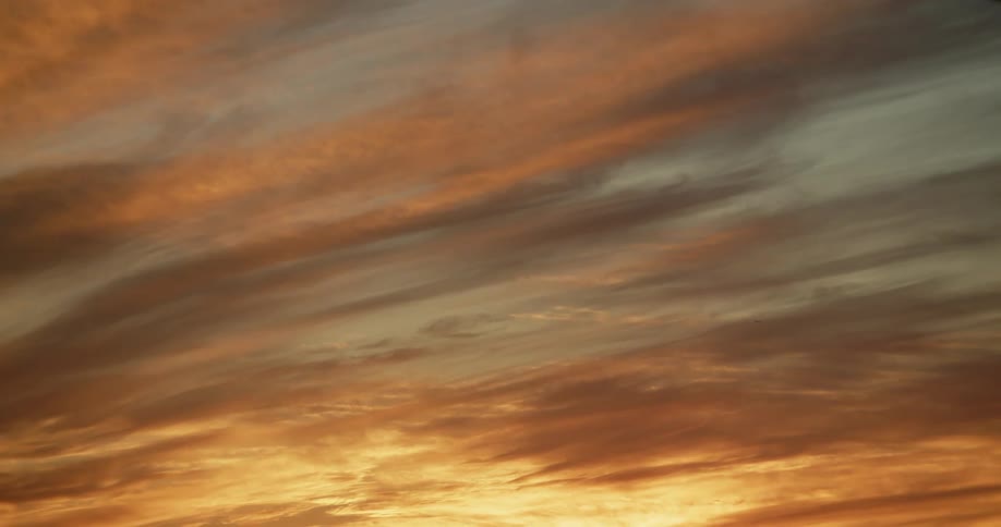 Panoramic view of high colored yellow golden clouds on the horizon at evening
