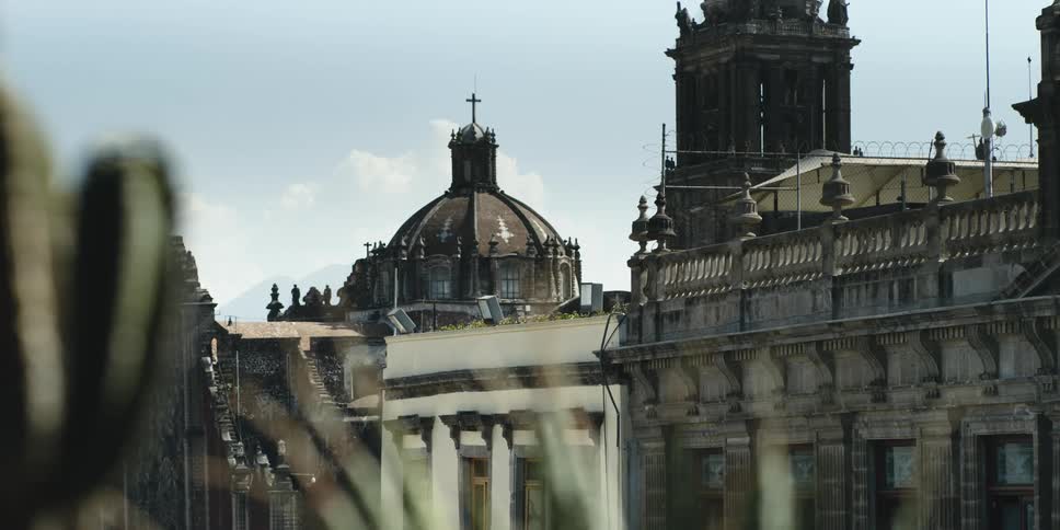 Towers and domes on a monastery or cathedral in the city at daytime