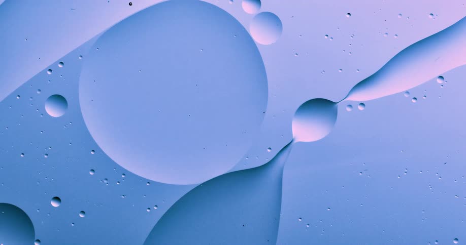 Abstract oil moves on the surface of liquid