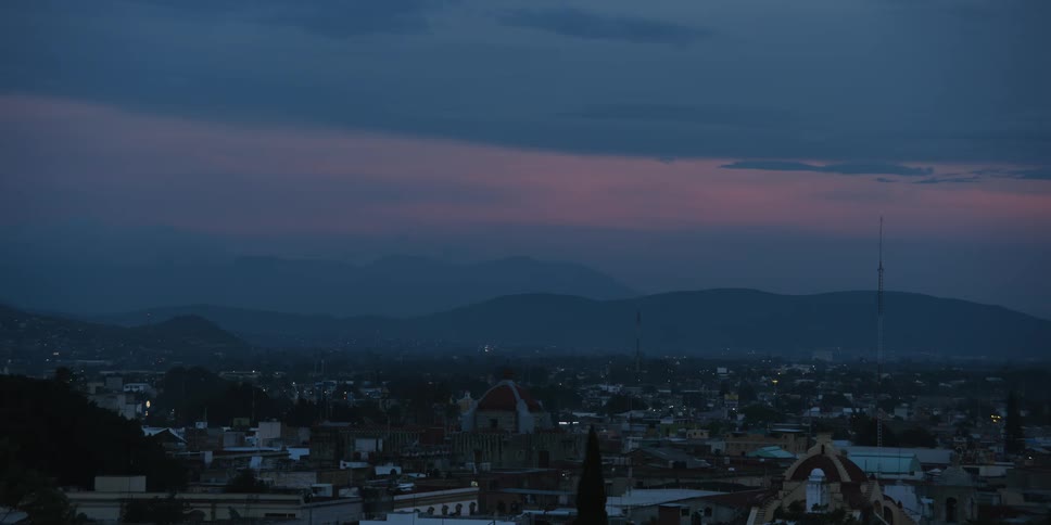 Landscape of city buildings at dusk