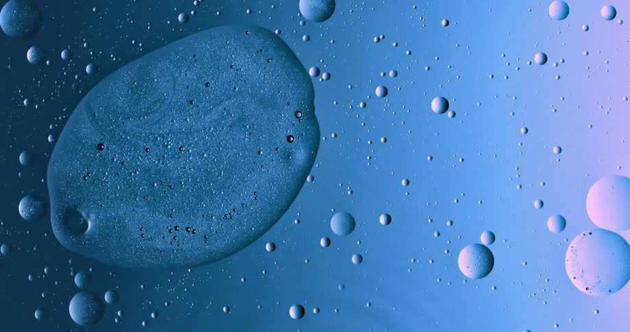 Abstract footage of bubbles moving in liquid