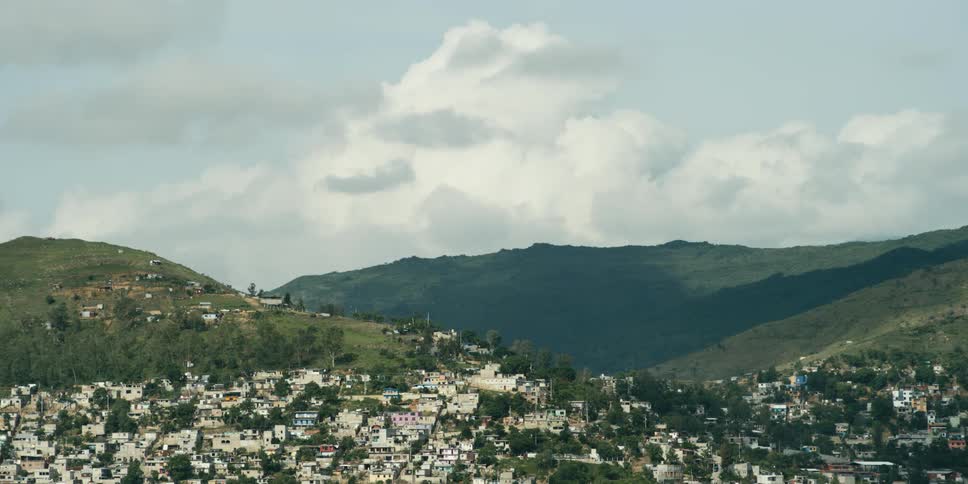 Landscape of city buildings on hill slopes