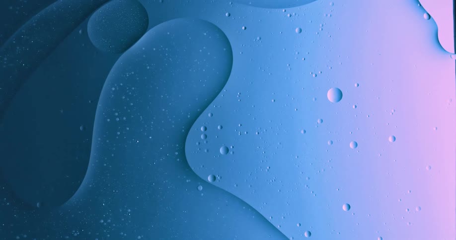 Abstract footage of bubbles moving in liquid