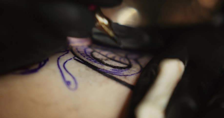 A person is receiving a tattoo