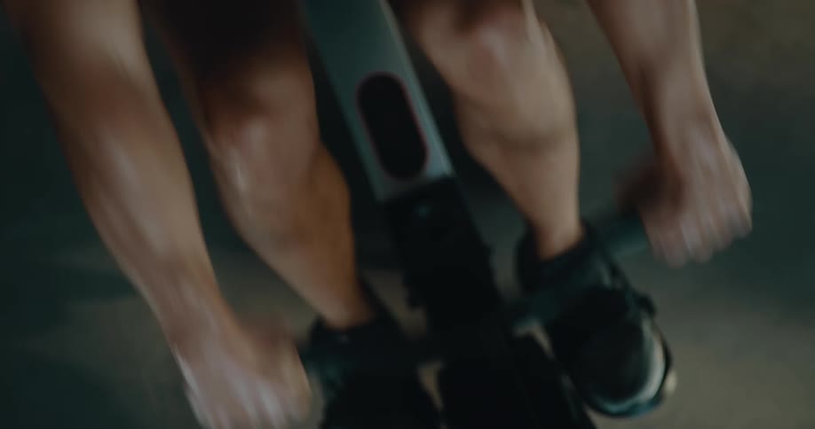 A man using a row machine during a workout