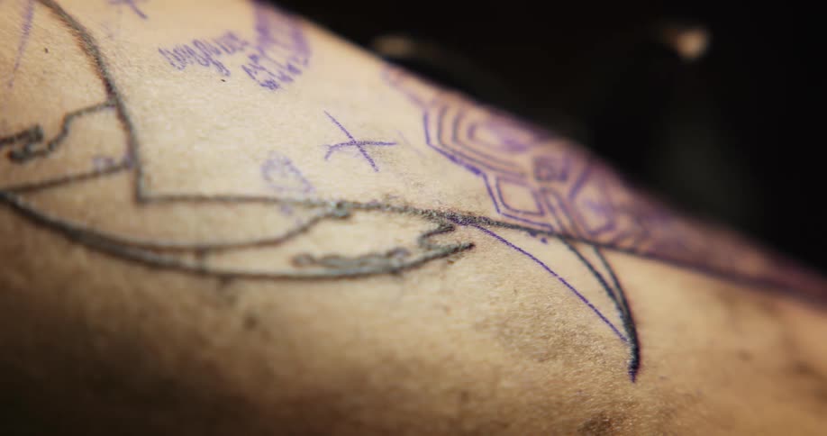 A person is getting a tattoo