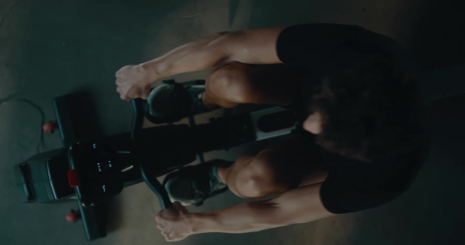 A man is working out on an exercise machine