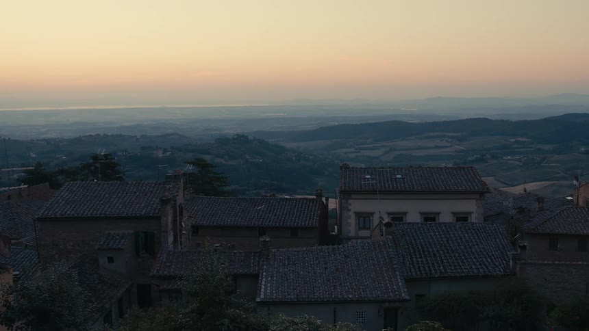 The sun is setting on the small town