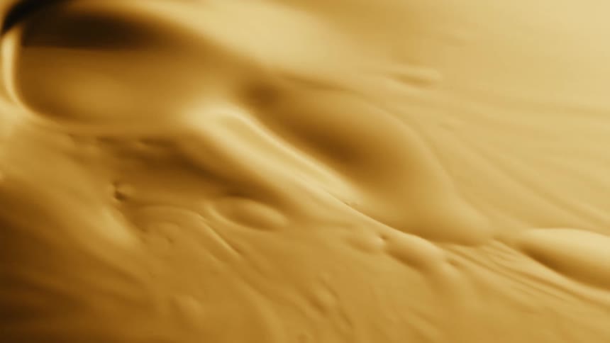 Chips in smooth mixture surface and submerge as mixture is mixed