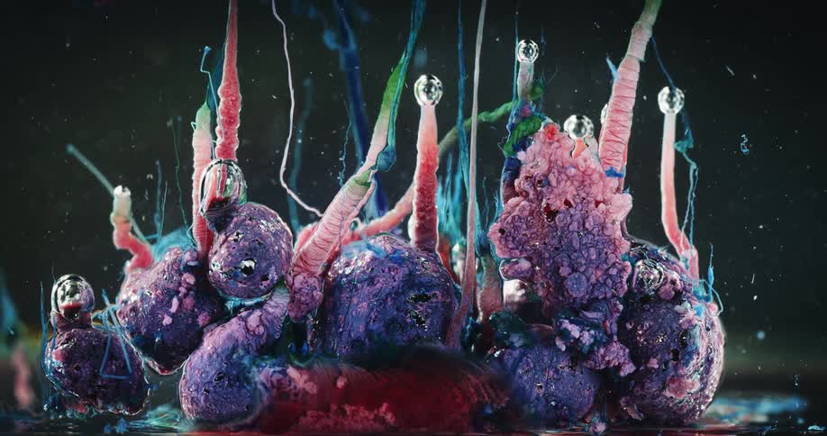 A mass that resembles alien coral shoots up tentacles and bubbles
