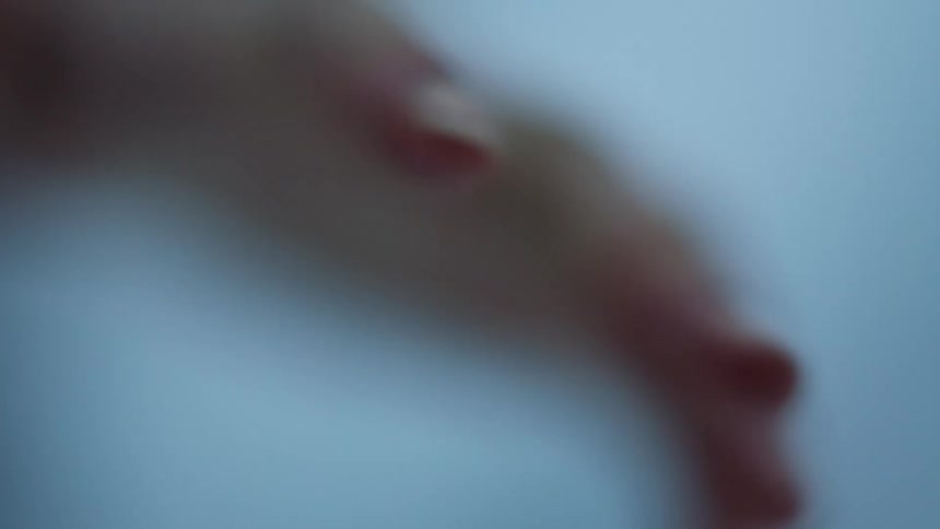 A close up of a person's cold hands moving