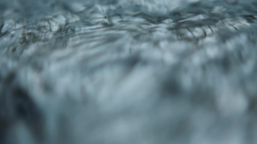 Close up of water flowing quickly