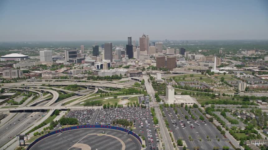 Aerial footage approaching Turner Field and flying over the downtown Atlanta skyline on a clear day