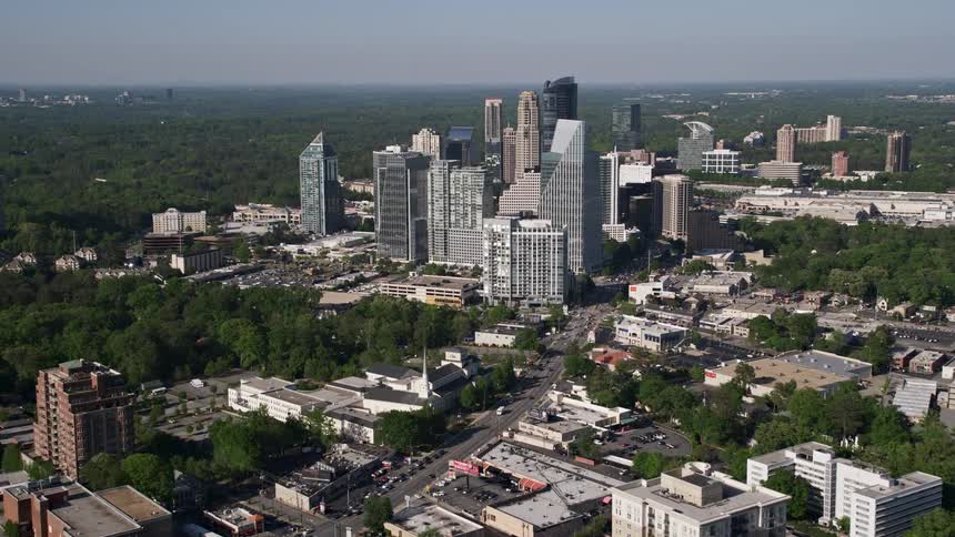 Aerial view of modern skyscrapers and high rise buildings circling Terminus Atlanta in Buckhead Georgia