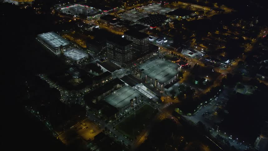 Approaching Lindbergh Center office buildings in Buckhead Georgia filmed at night with clear skies