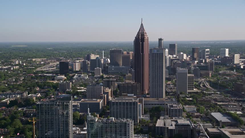 Approaching the towering skyscrapers of Midtown Atlanta Georgia on a sunny day