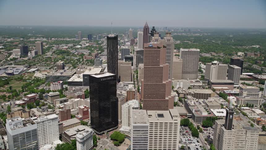 Approaching Atlantas downtown area tall skyscrapers dominate the city skyline in this aerial footage
