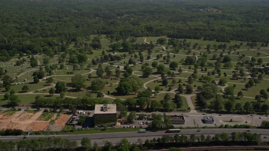 Approaching an aerial view of Westview Cemetery in Atlanta Georgia on a sunny day