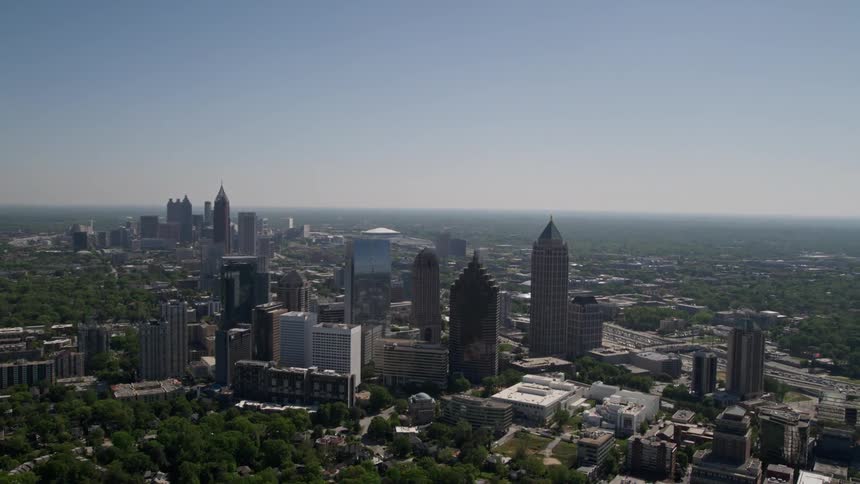 A stunning aerial view of the tall skyscrapers in Midtown Atlanta Georgia on a sunny day