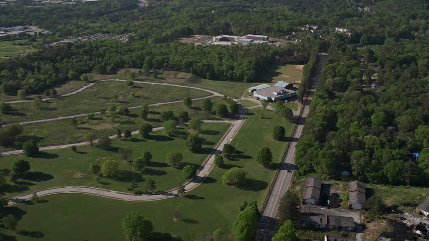 Aerial view of Williams Elementary School nestled among trees in a rural area of Atlanta Georgia during a sunny day
