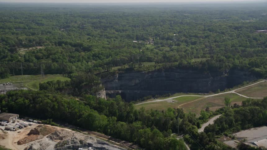 Approaching an industrial quarry bordering a wooded area in Atlanta Georgia