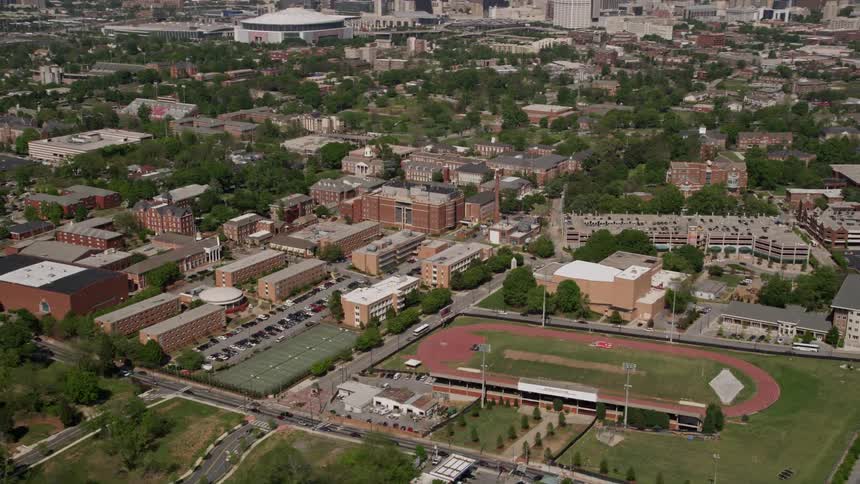  aerial footage of the BT Harvey Stadium and Morehouse College campus in Atlanta Georgia during a sunny day showcasing college athletics and higher learning