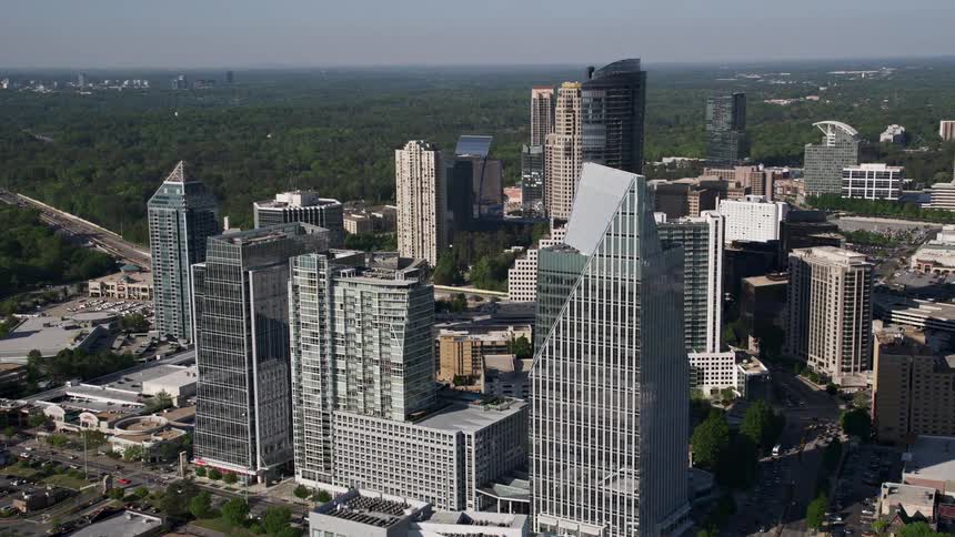 Aerial footage of approaching and circling skyscrapers in Terminus Atlanta Buckhead Georgia during the day
