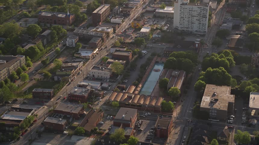Aerial footage captures the Martin Luther King Jr Memorial Fountain and surrounding buildings in Atlanta Georgia during the daytime