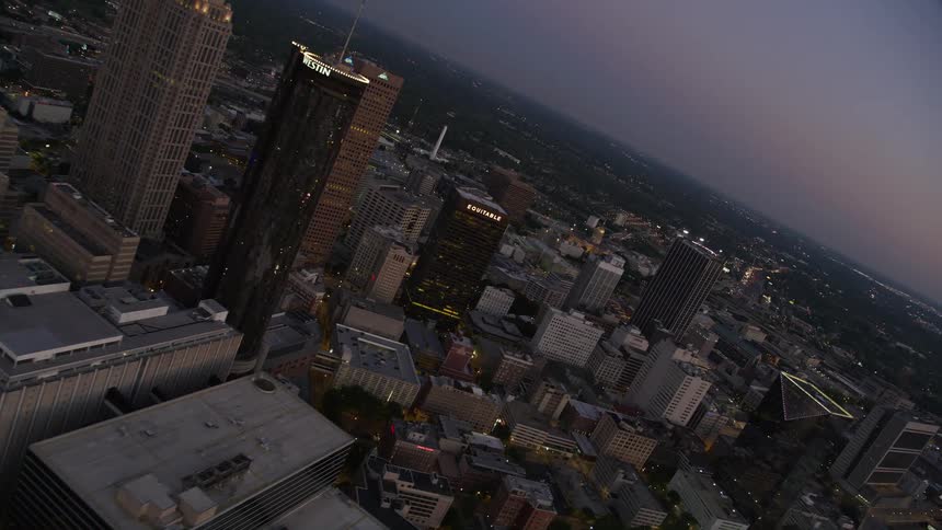 Aerial view of Atlantas Downtown skyscrapers during sunset approaching from Midtown