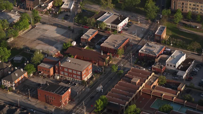 An aerial view of Our Lady of Lourdes Catholic Church in East Atlanta during a sunny day