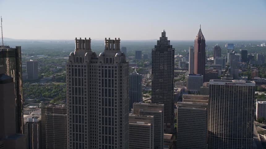 Aerial footage captures the towering skyscrapers and impressive architecture of Downtown Atlanta Georgia on a sunny summer day