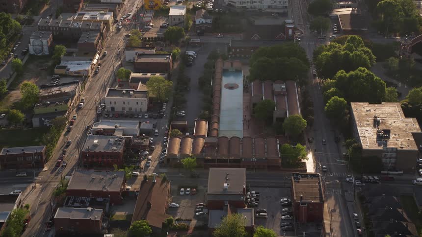 An aerial view of Martin Luther King Jr Memorial Fountain tilting down from the sky in sweet Auburn historic district of Atlanta Georgia during a sunny day