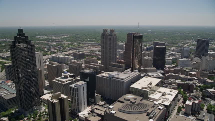 A stunning aerial view of downtown Atlantas skyscrapers and high-rise office buildings during a sunny day