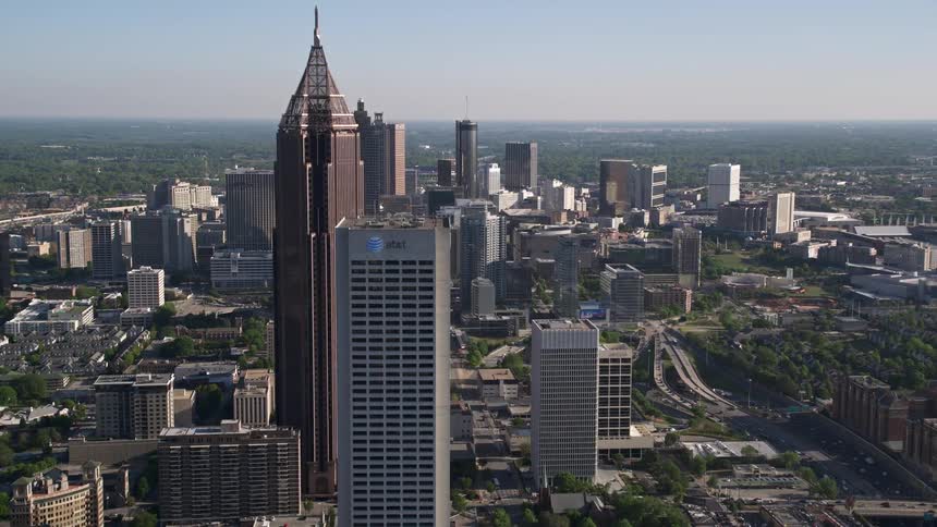 Approaching Bank of America Plaza and Midtown skyscrapers towards Downtown’s impressive skyline in sunny Atlanta