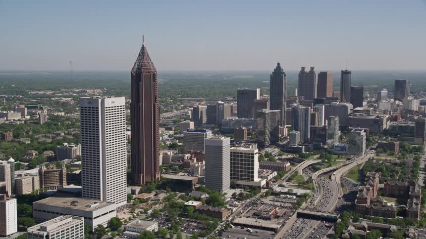 A stunning aerial view of Atlantas high rise buildings in the downtown area during a sunny day