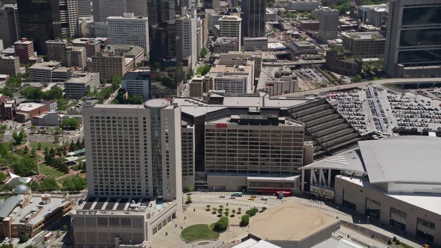 Aerial view of CNN Center and Omni Hotel in downtown Atlanta Georgia during daytime