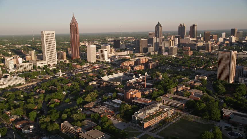 A breathtaking aerial view of Midtown Atlantas skyscrapers and Bobby Dodd Stadium at historic Grant Field