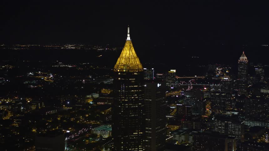 Aerial view of Bank of America Plaza in Midtown Atlanta with a clear night sky